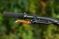 mountain-bike-handlebar-textured-grip-orange-brake-lever.jpg
